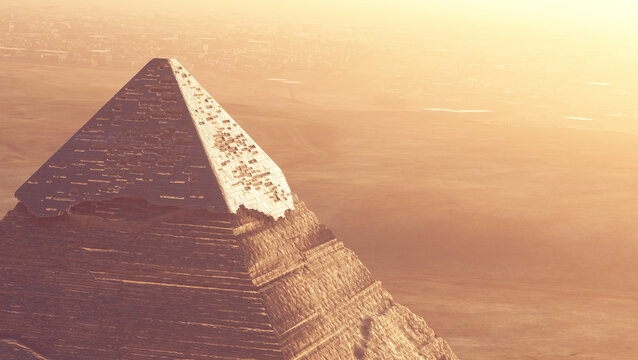 Top of Khafre pyramid at warm light on a hot foggy evening 
