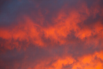 Red and purple clouds in the sky at sunset