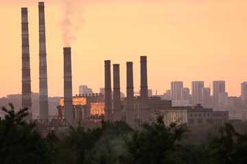 Fototapeta na wymiar industrial factory at sunset