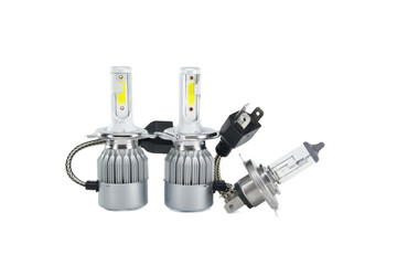 H4 halogen lamp and LED headlight bulbs on white