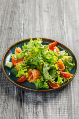 Healthy food. Salad with salmon
