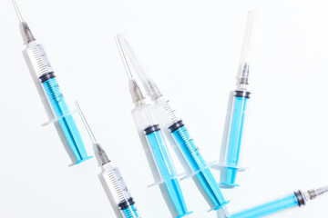 Disposable plastic syringe prepared for injection and vaccination in the hospital. The concept of medicine and health