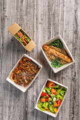 Top view of assortment of healthy food to go. Healthy food in takeaway containers