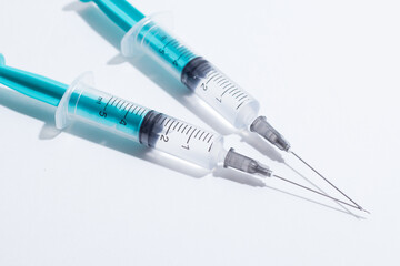 Disposable plastic syringe prepared for injection and vaccination in the hospital. The concept of...