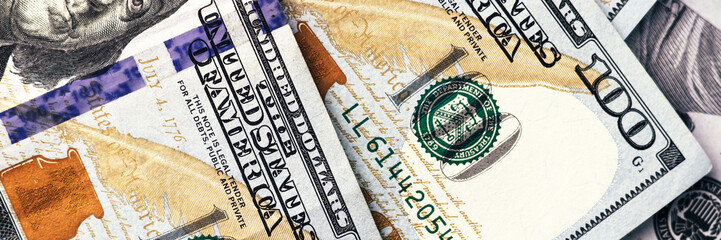 American paper dollar bills background. Hundred dollar banknotes texture, currency concept banner. Wide panoramic header