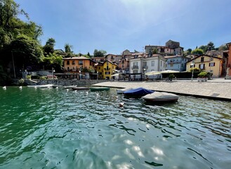 Fototapeta na wymiar Panoramic view of idyllic lakeside town Mergozzo, Upper Italian lakes, Piedmont, Italy.