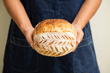 A loaf of freshly baked sourdough bread.