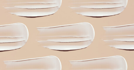 pattern cosmetic smears of creamy texture on a pastel beige background - obrazy, fototapety, plakaty