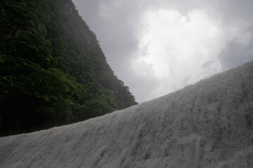 waterfall with mountain sky cloud