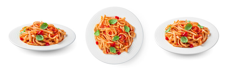 Traditional Italian linguini pasta with tomatoes and basil is isolated on a white background. A set...