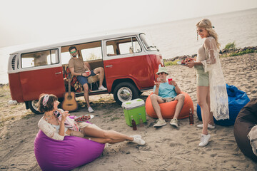 Photo of positive student buddies enjoy peaceful summer camping wear casual outfit nature seaside...