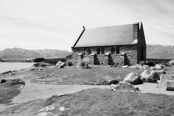 Lake Tekapo chapel in New Zealand. Black and white retro photo style.
