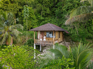 Railay Beach Krabi Thailand, a tropical beach of with backpacker bamboo huts in the jungle. beautiful bamboo hut in the jungle by the ocean