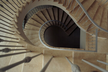 Beautiful spiral staircases of a modern luxury building, spiral geometry.