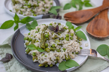 Spring food; Delicious risotto with asparagus and wild garlic