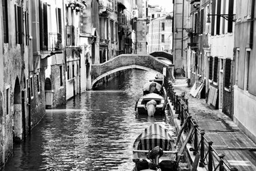 Venice Italy canal city. Black white photo retro style. Italian landmark.