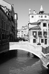 Venice Italy canal bridge. Black white photo retro style. Italian landmark.
