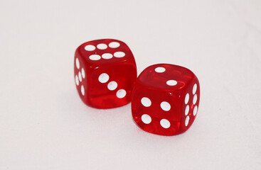 two red dice with number six and two