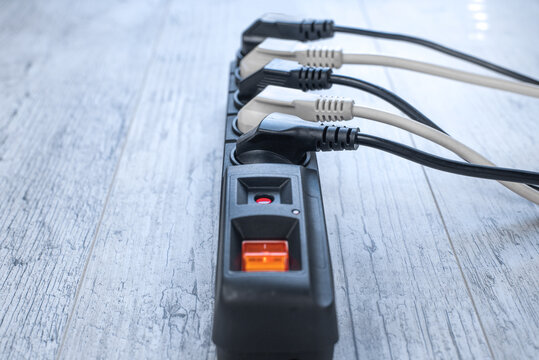 The power plugs and a one multi socket electrical splitter with the surge protection.