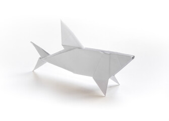 Paper shark origami isolated on a white background