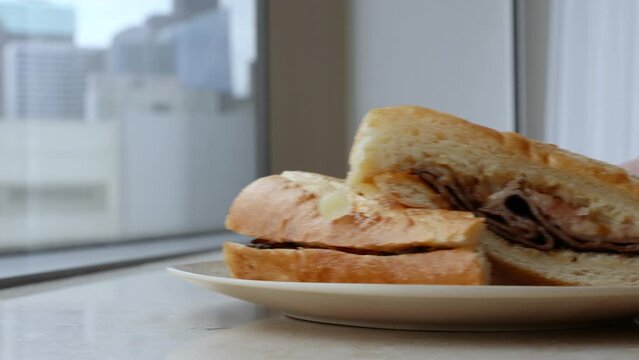 Serving a Roast Beef French Dip Sandwich