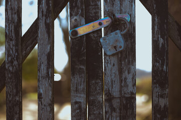 old weathered locked graveyard gate in Latvia cemetery