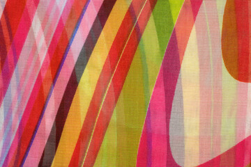Multicolor background.  Drawing on fabric of red white yellow green purple black blue colors. Abstract background for design. Painted wallpaper.