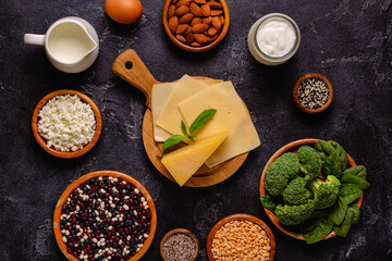 Products rich in calcium on dark background.