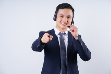 Image of young Asian businessman on background