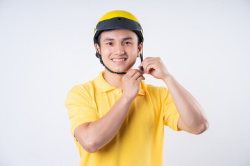 Image of young Asian delivery man on background