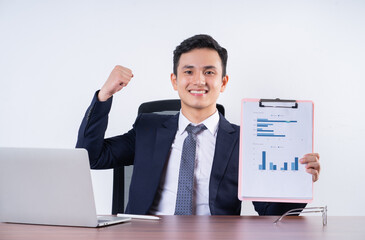 Image of young Asian businessman on background