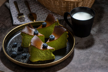 still life basque burnt cheese cake with a cup of milk.