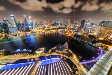 Fototapeta na wymiar Scenic night aerial view of Marina Bay in Singapore