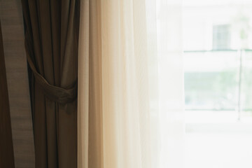 soft brown curtain with morning light from window home interior design detail decorate ideas concept