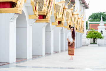 Young asian woman walking meditation, Sanctuary Ratchanatdaram bangkok.