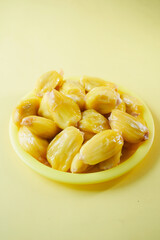 top view of slice of jackfruits in a bowl on table.