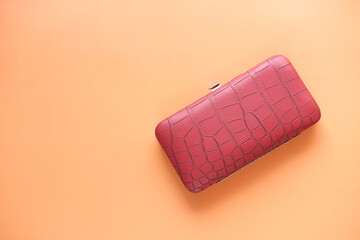  red color women purse wallet on color background 