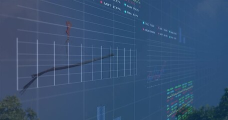 Animation of financial data and graphs over machines on junkyard - Powered by Adobe