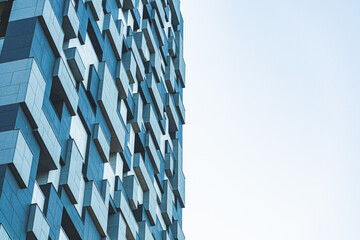 underside panoramic and perspective view to steel blue glass high rise building skyscrapers, business concept of successful industrial architecture