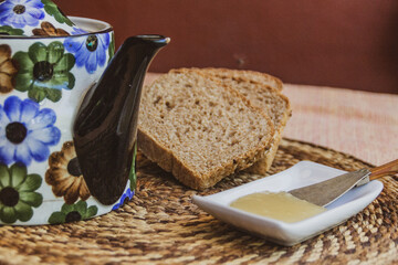 still life with a cup of tea and teapot