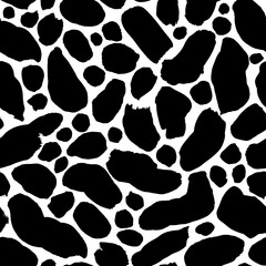 Black uneven specks, spots, ink blobs seamless pattern. Hand drawn black and white freehand drawing. Abstract background with round brush strokes. Vector chaotic organic dots. Simple ornament