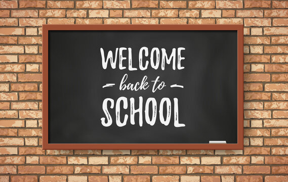 Welcome back to school banner. Realistic black chalkboard with chalk text on brown brick wall in classroom. Vector illustration for web, poster mockup, school class design background, card.