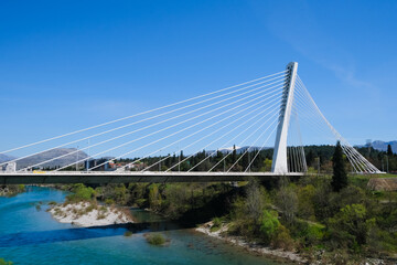 suspension millennium bridge over the Moraca river, Podgorica, Montenegro. Golden gate bridge in...