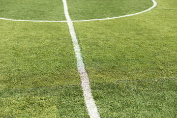 Obraz premium Marking of football field. White stripe on green grass. Sports stadium.