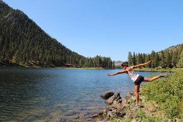Fototapeta na wymiar River in Montana with a yoga woman