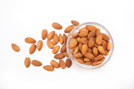 Close-up of natural big raw peeled almonds nuts as a background