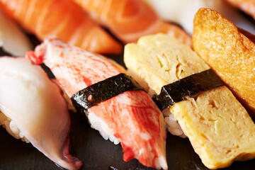 Different types of sushi on a plate