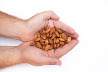 Close-up of natural big raw peeled almonds nuts as a background