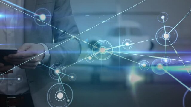 Animation of data processing over caucasian businessman using smartphone