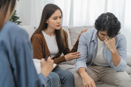 couple relationship therapy with a counselor. Close Up hands of the woman client during a conversation with psychologist to find problems and solution.